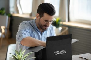 Man receiving welcome pack